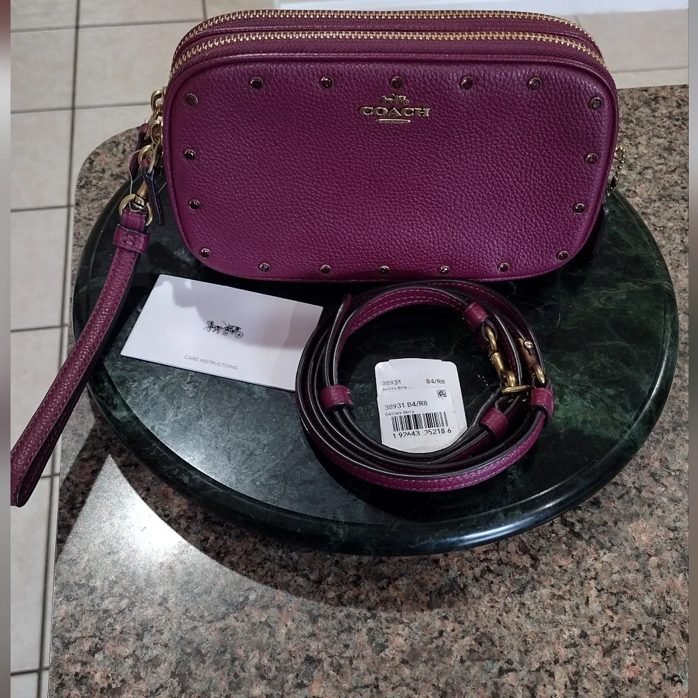 NWT Coach Cristal Border Rivets Dark Berry Crossbody / Clutch in Pebble …